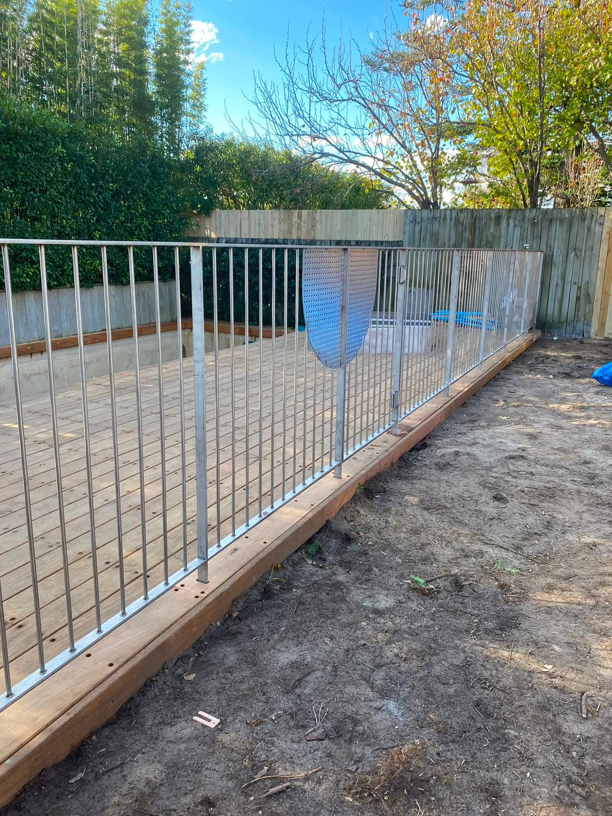 Rod pool fence along edge of timber deck